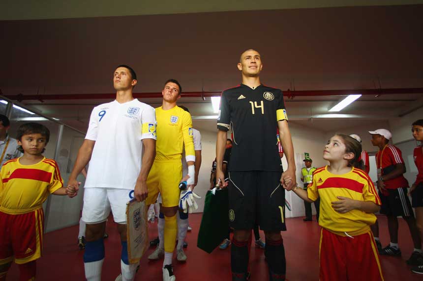 Jason Lowe leads out England against Mexico